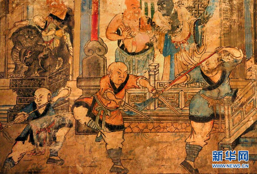 少林寺白衣殿內(nèi)的墻上表現(xiàn)少林武僧習(xí)武練拳的壁畫(局部,2005年9月15日攝)。
