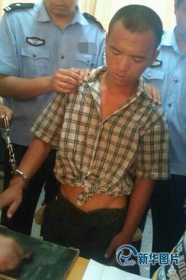 2013年8月20日午間，河南省安陽警方將“8.19公交搶劫案”嫌犯24歲的周江波緝拿歸案。圖片來