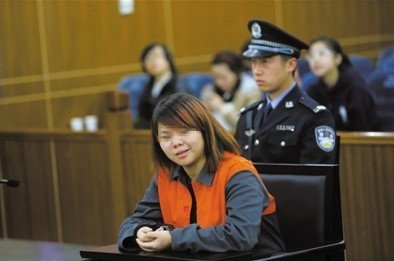 2013年4月3日，被告人小萍在法庭上受審。新京報記者 王貴彬 攝