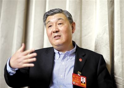 今年全國兩會期間，全國人大代表、浙江高院院長齊奇接受記者采訪。新京報記者 陳杰 攝