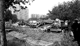 對公園選址的5.5萬多平方米的違章建筑進(jìn)行拆除。
