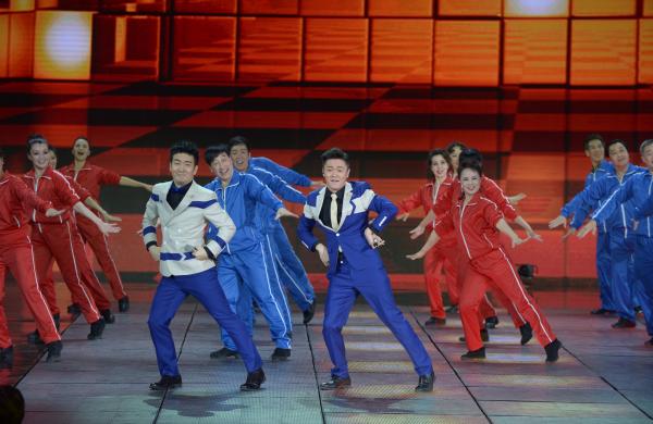 《小蘋果》、《最炫民族風》等廣場舞曲將會有全國統(tǒng)一、編排科學、帶給人正能量的全新動作。 CFP 資料