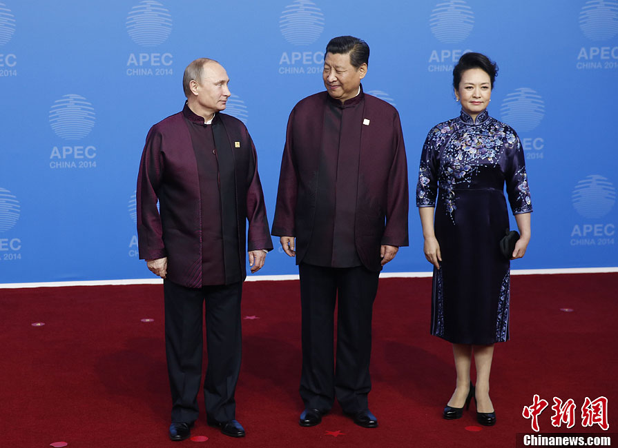 圖為習近平夫婦歡迎俄羅斯總統(tǒng)普京。中新社發(fā) 杜洋 攝